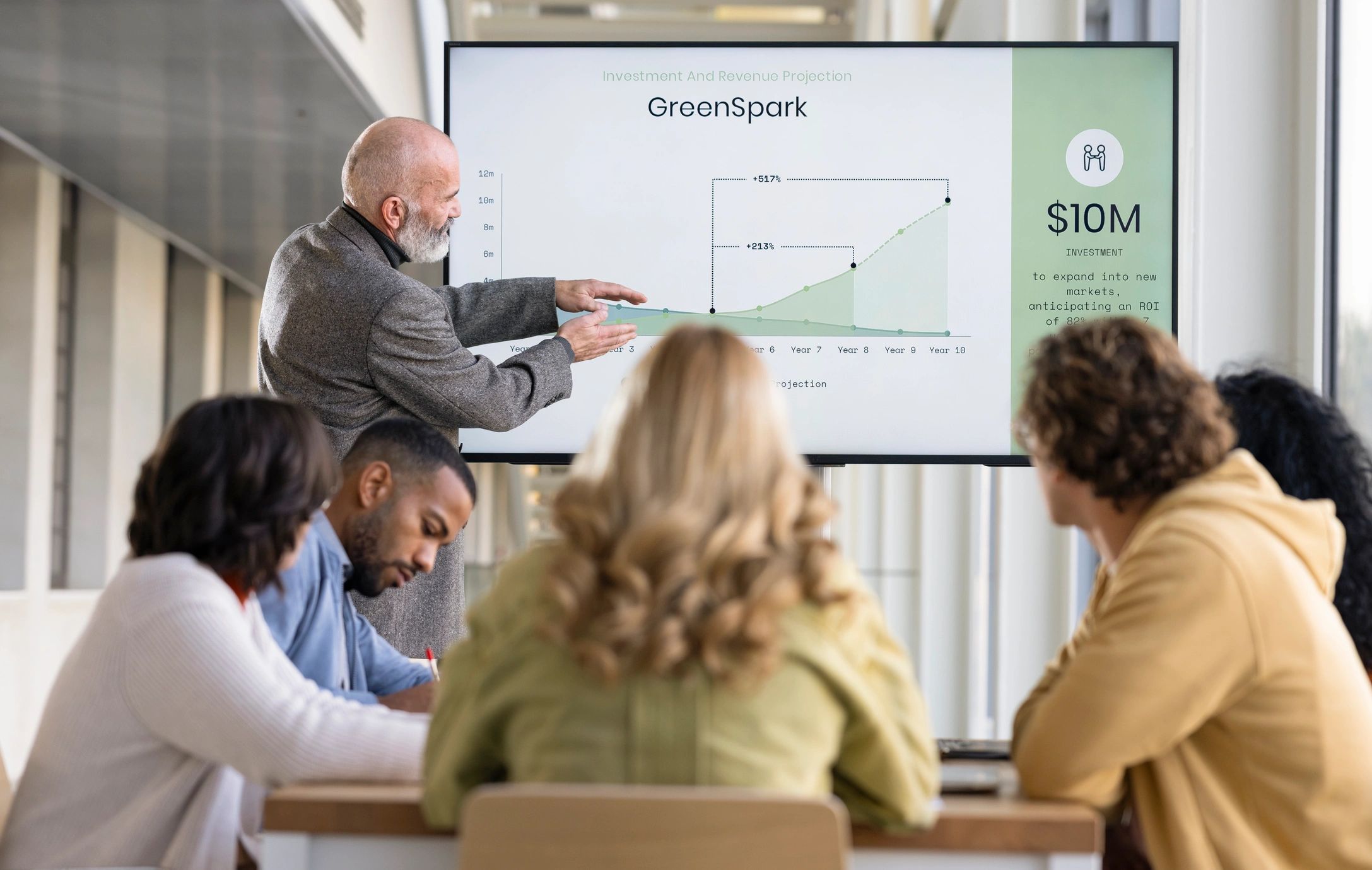 Professionals attending a financial education presentation